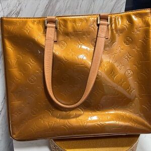 Louis Vuitton Brentwood in Vernis Gold Leather